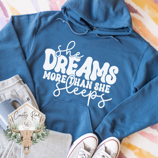 She Dreams More Than She Sleeps